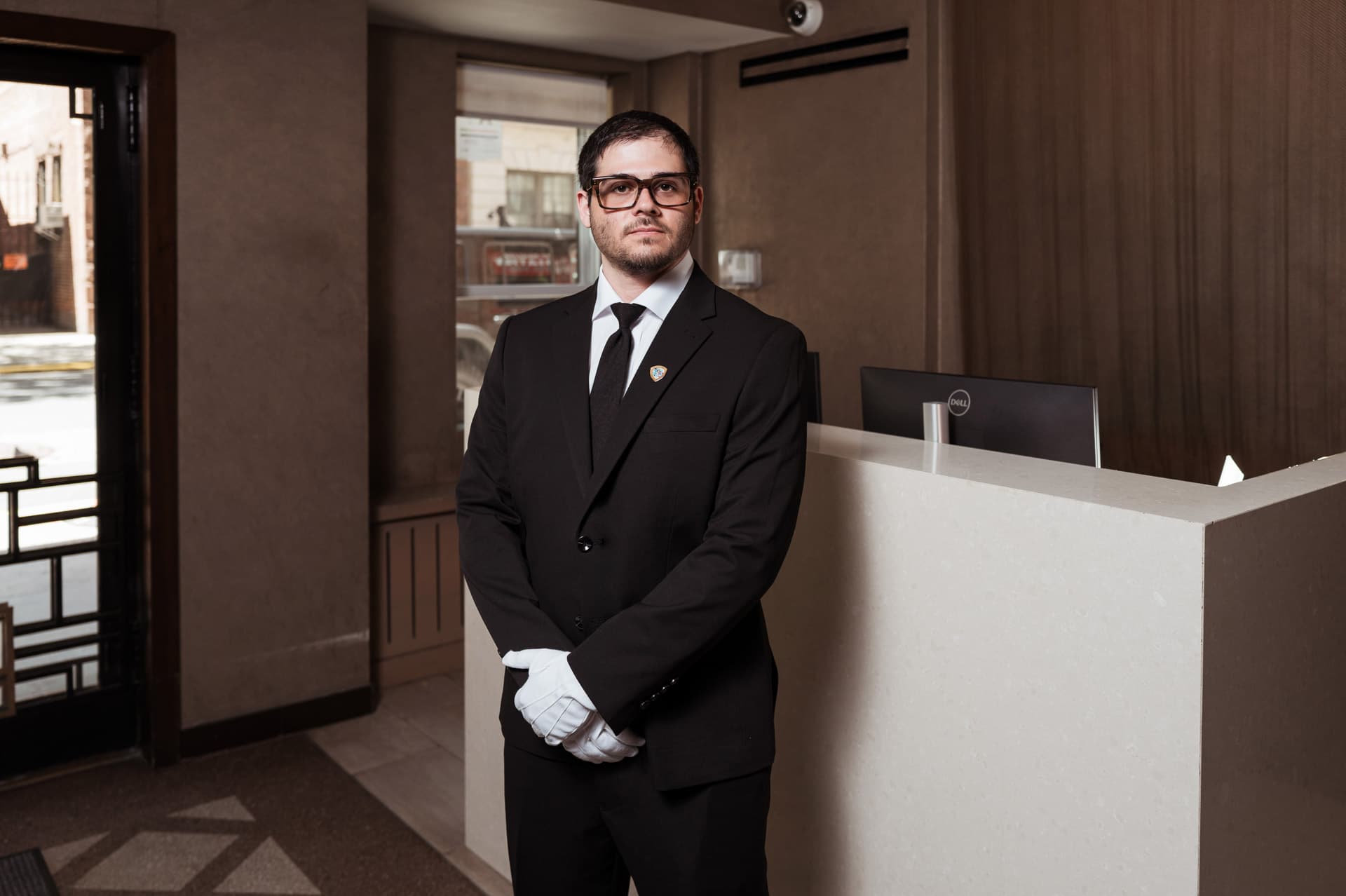 Image of Security USA® white glove doorman.