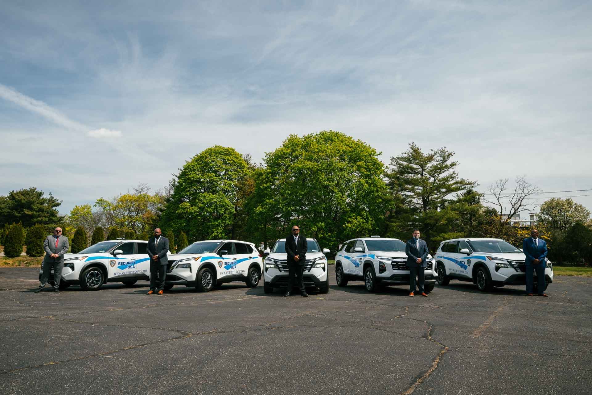 Security vehicles with company security personnel on site patrol